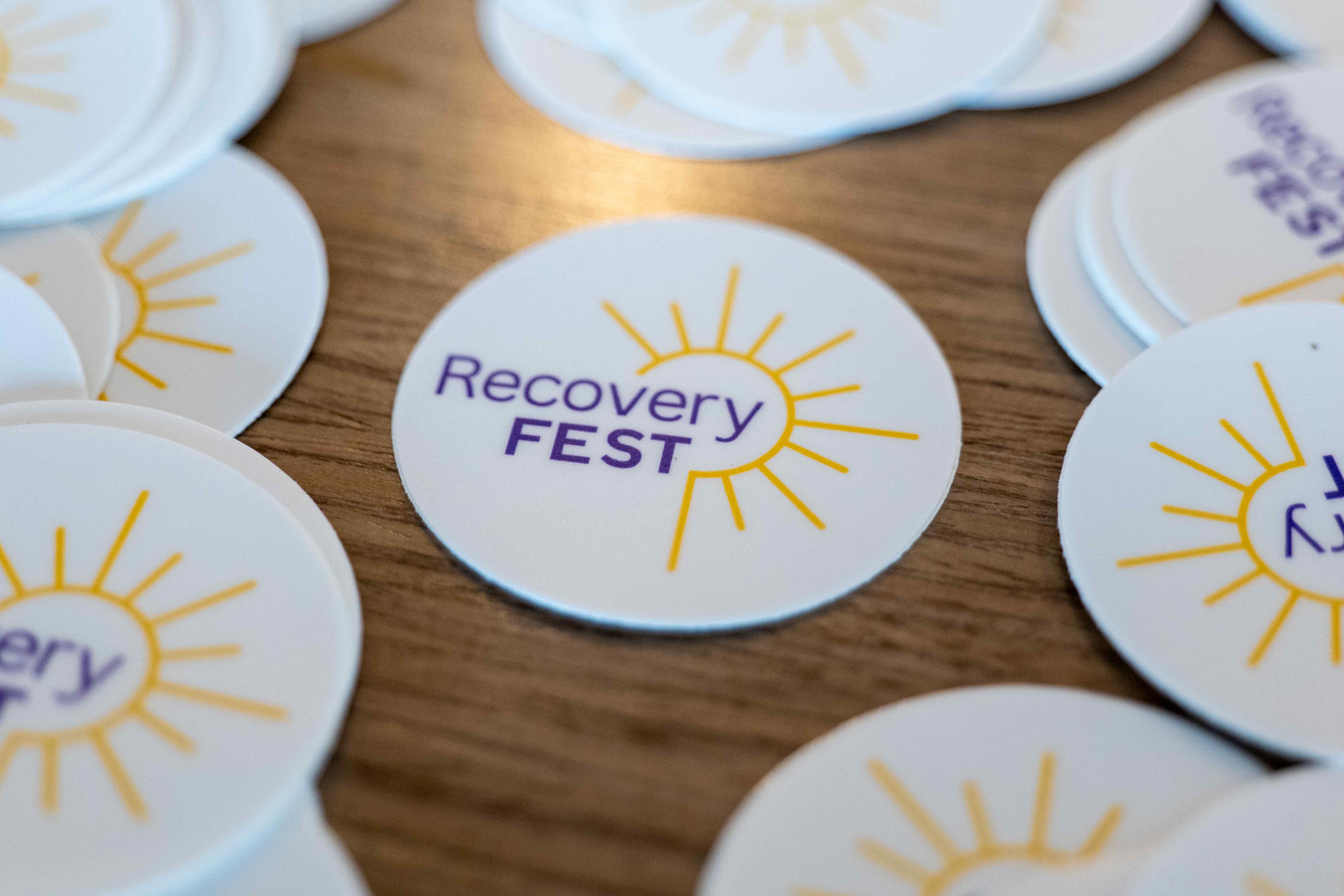 Resource table with volunteers connecting with attendees