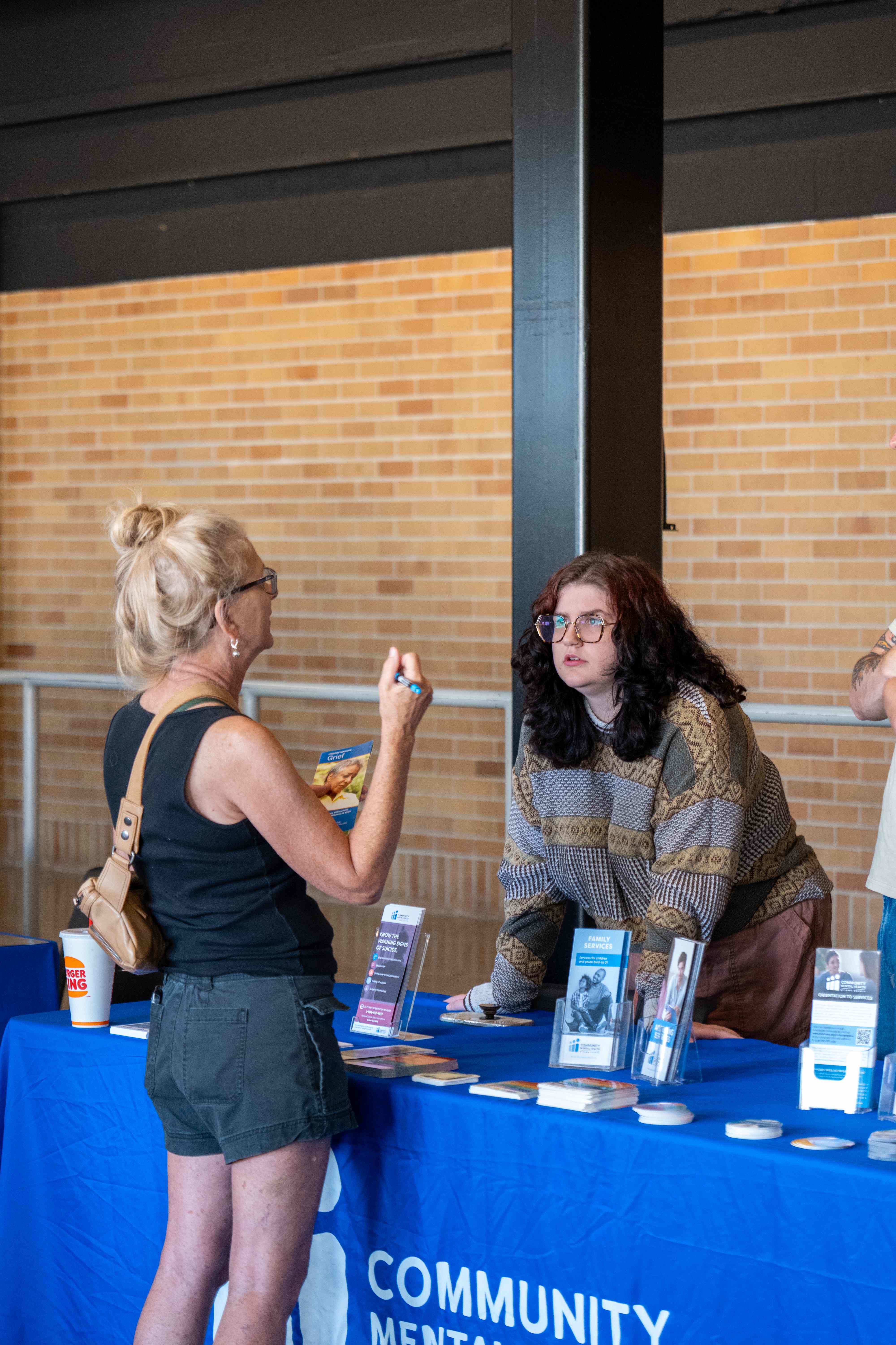 Community member conversing with resource provider